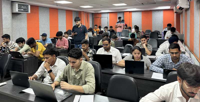 Coding Blocks students working together on coding exercises