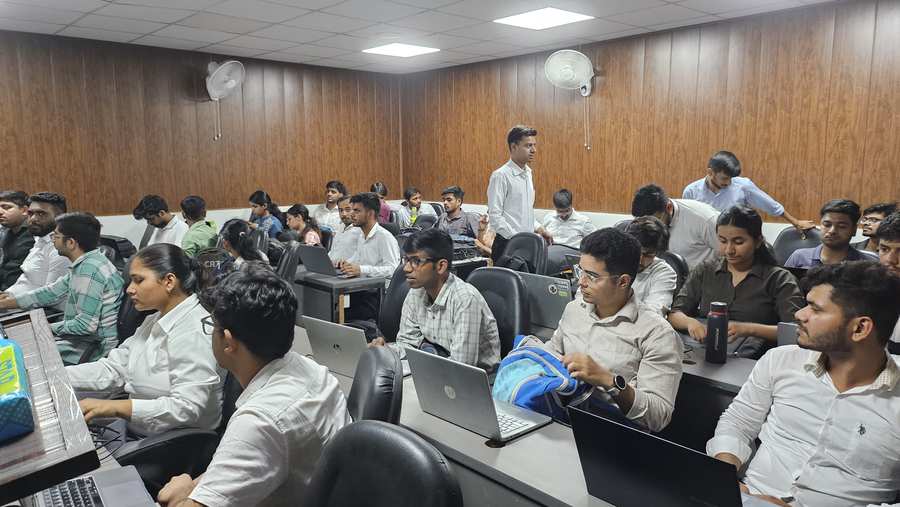 Students practising on laptops in a Coding Blocks classroom